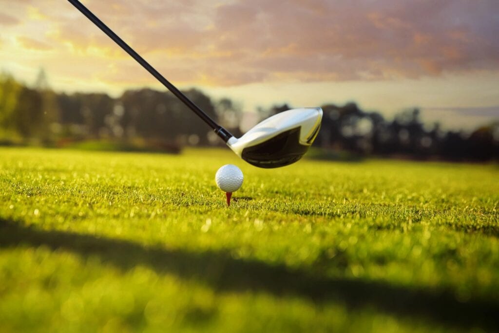 A Golf Ball on a Pin on a Golf Ground
